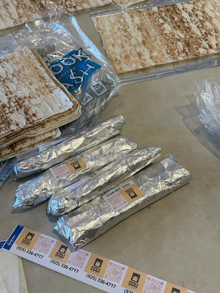 Sufra e Zahra meal packing and distribution