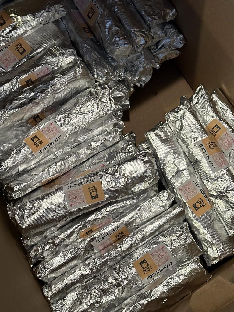 Sufra e Zahra meal packing and distribution