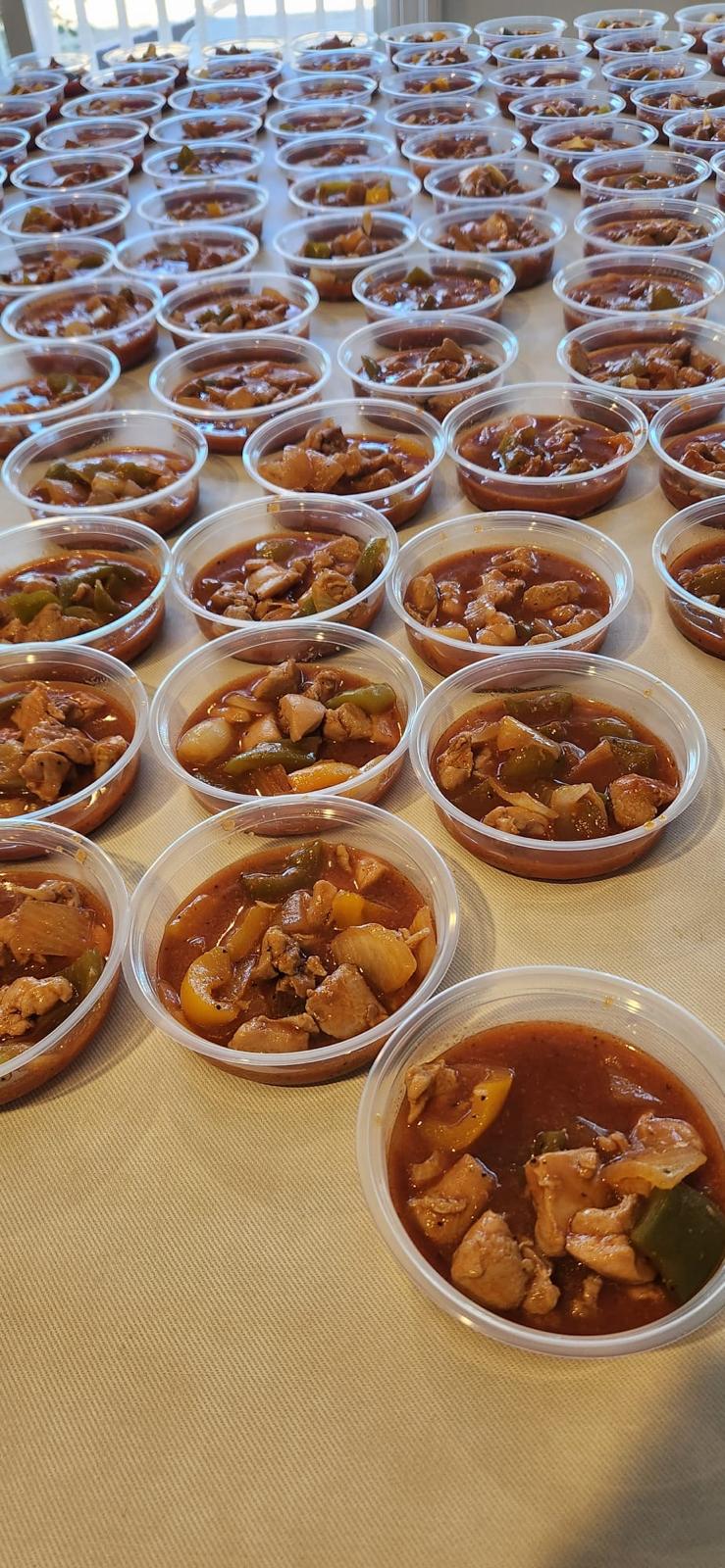 Sufra e Zahra meal packing and distribution